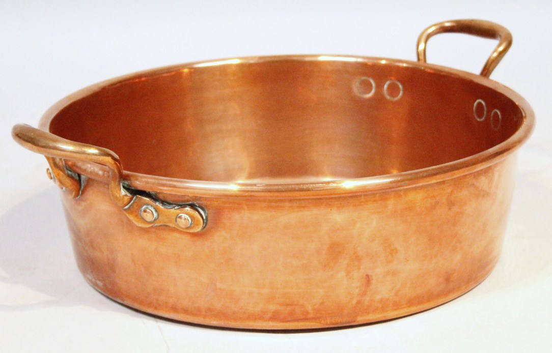 Appraisal: A early thC copper two handled bowl the circular body