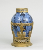 Appraisal: A Rich Blue Porcelain Glazed Vase With Brass Overlay A