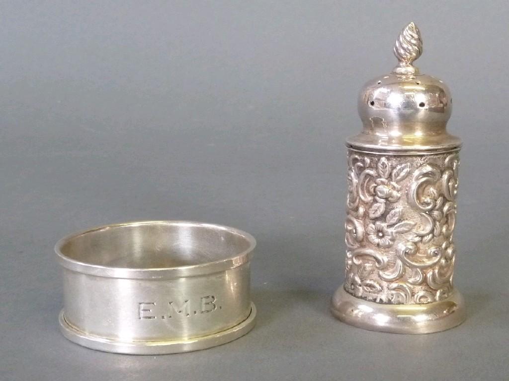 Appraisal: EDWARDIAN SILVER PEPPERETTE the cylindrical body stamped with scrollwork and