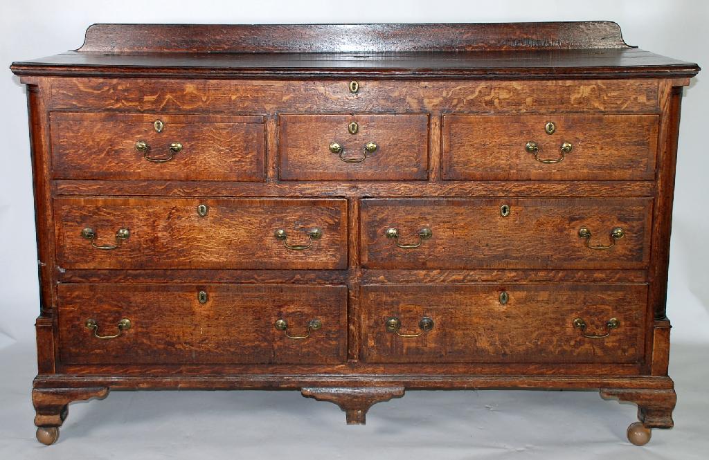 Appraisal: GEORGE III MAHOGANY CROSSBANDED OAK LANCASHIRE CHEST the hinged and