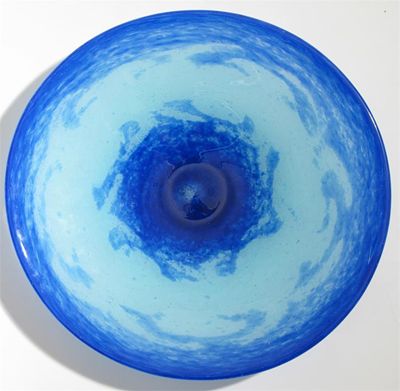 Appraisal: A Delatte Nancy footed glass bowl mottled blue cased in