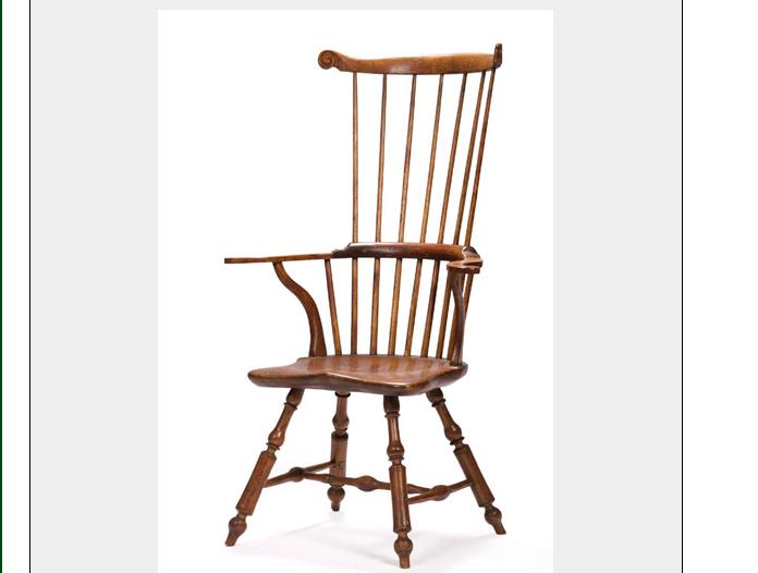 Appraisal: PHILADELPHIA COMB-BACK WINDSOR ARMCHAIR The serpentine crest rail with scrolled