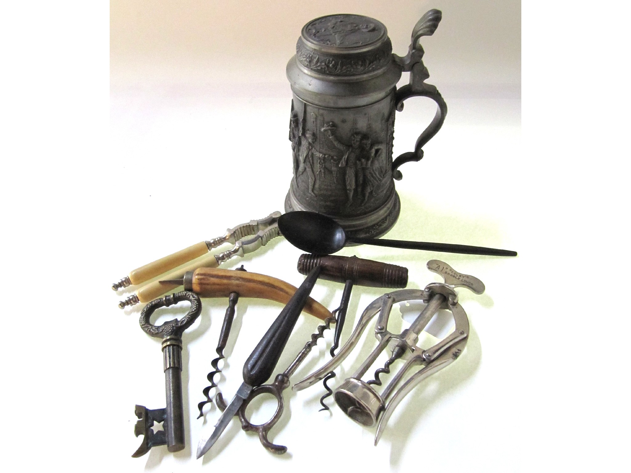 Appraisal: A box of miscellania - metal tankard corkscrews etc