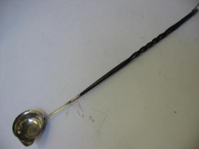 Appraisal: A GEORGIAN PUNCH LADLE the circular bowl with flared rim