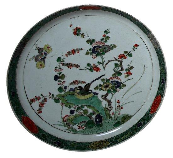 Appraisal: A famille verte saucer dish Kangxi decorated birds in flowering