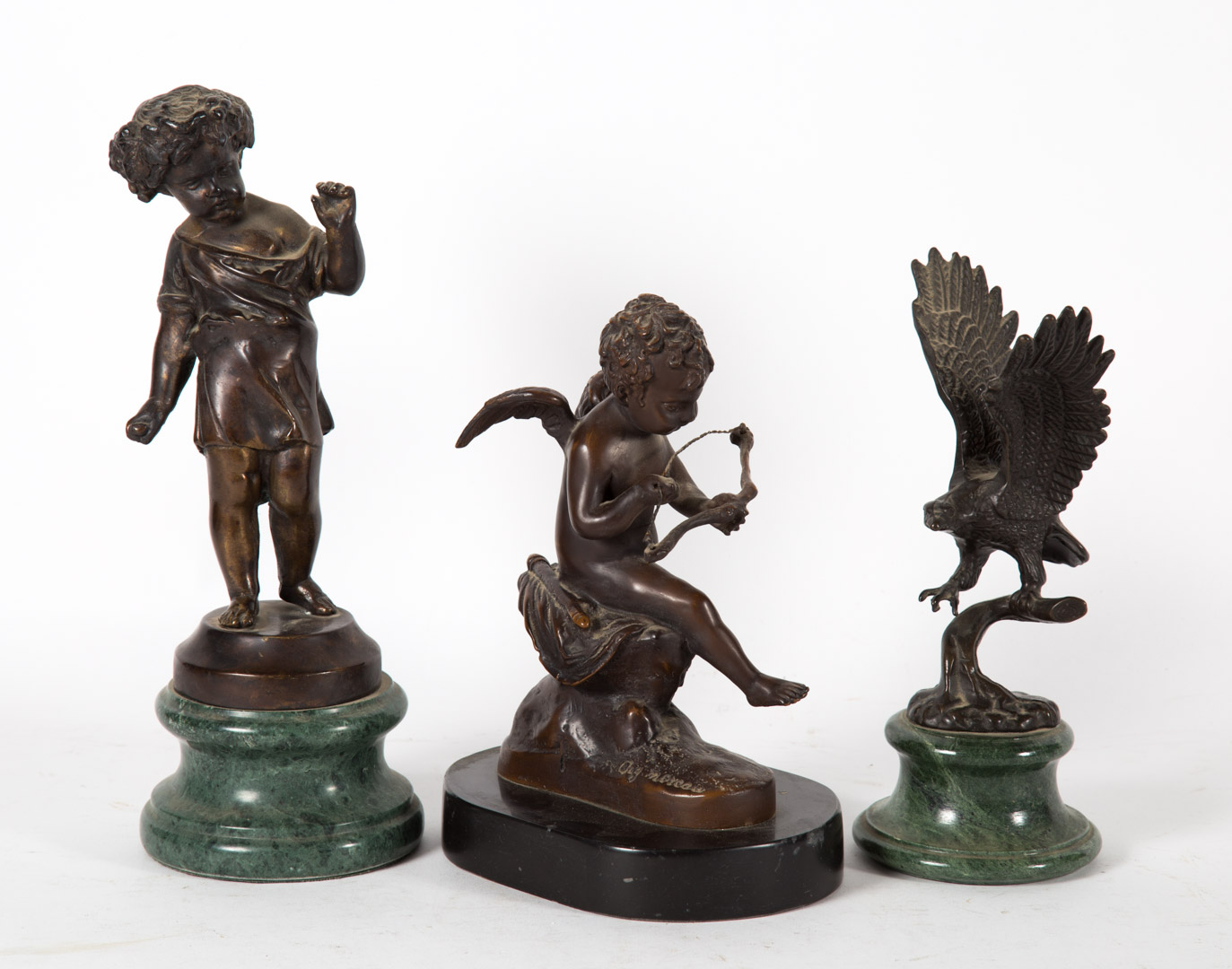 Appraisal: Three metal figures Undernumber