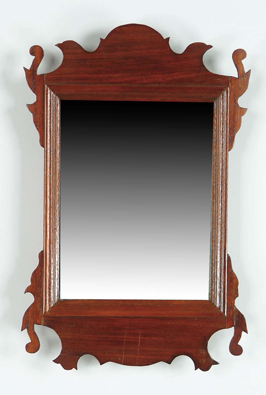 Appraisal: SMALL MAHOGANY CHIPPENDALE MIRROR Standard form with old glass Birds