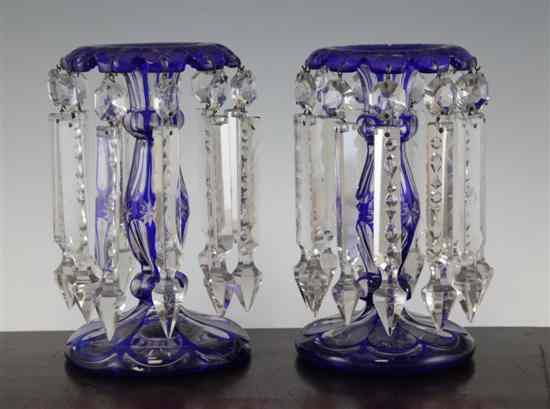 Appraisal: A pair of blue flashed and clear glass table lustres