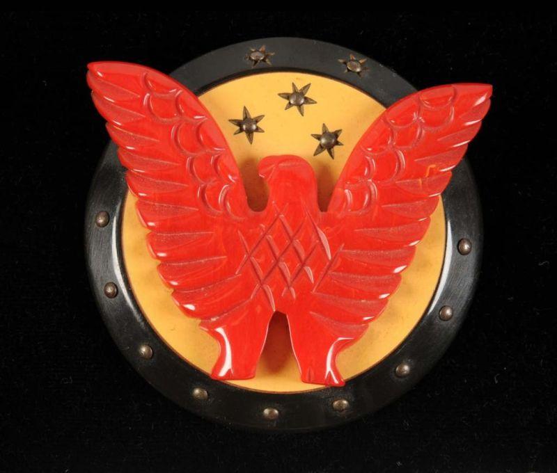 Appraisal: Bakelite Red White Blue Shield Pin with Eagle Condition Excellent