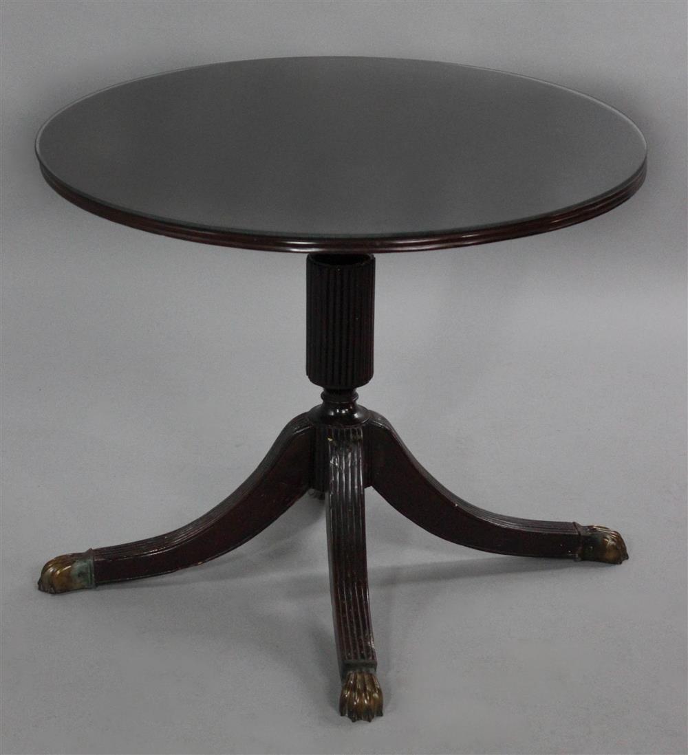 Appraisal: CLASSICAL MAHOGANY CARVED TEA TABLE the tea table with a