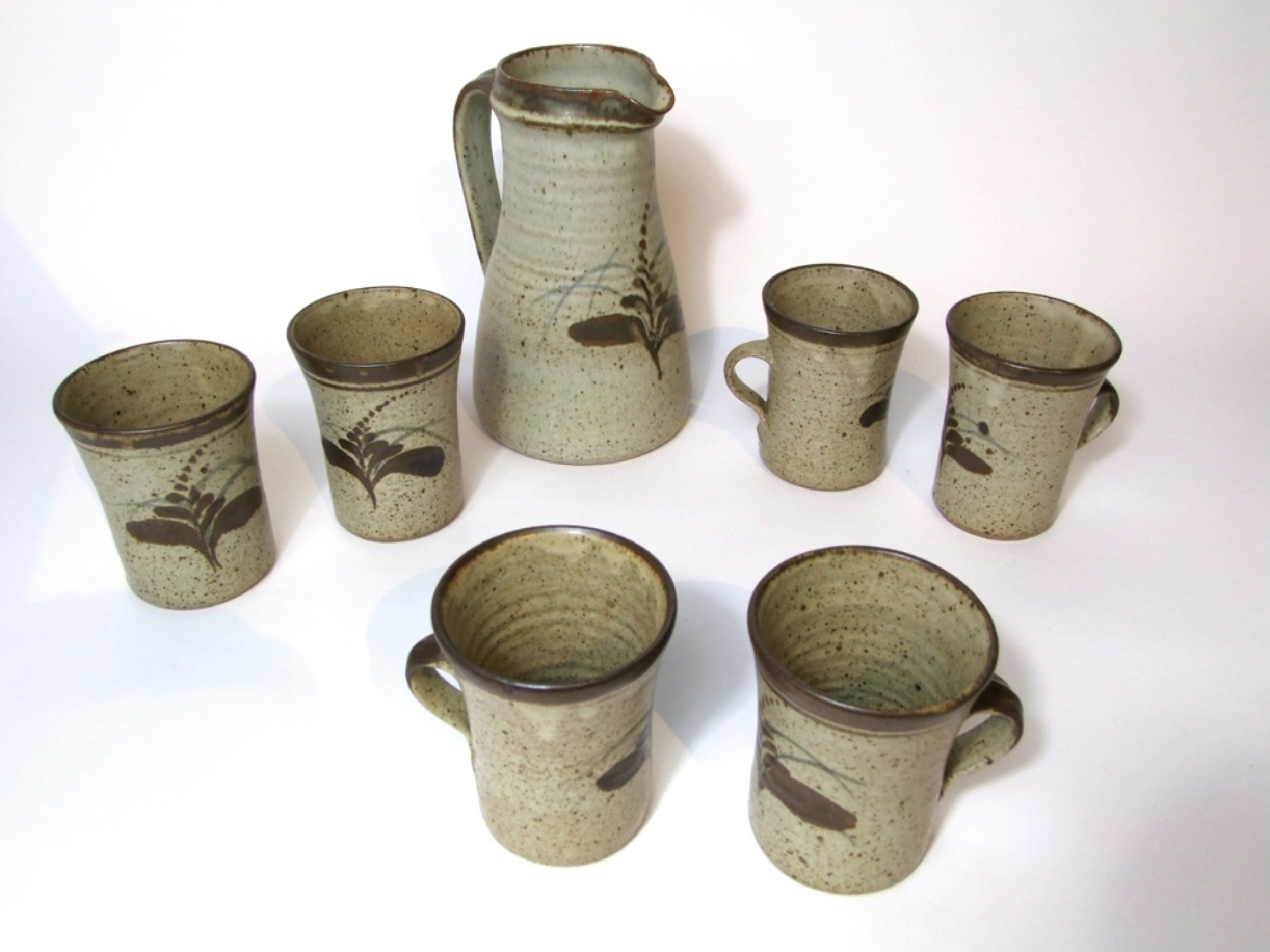 Appraisal: A Leach Pottery six place lemonade set comprising a jug