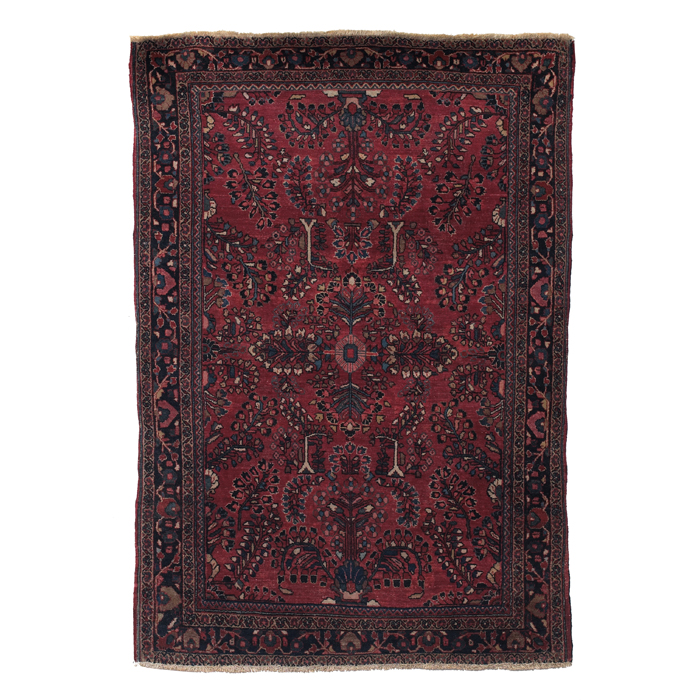 Appraisal: Sarouk rug c floral design on a red field ''