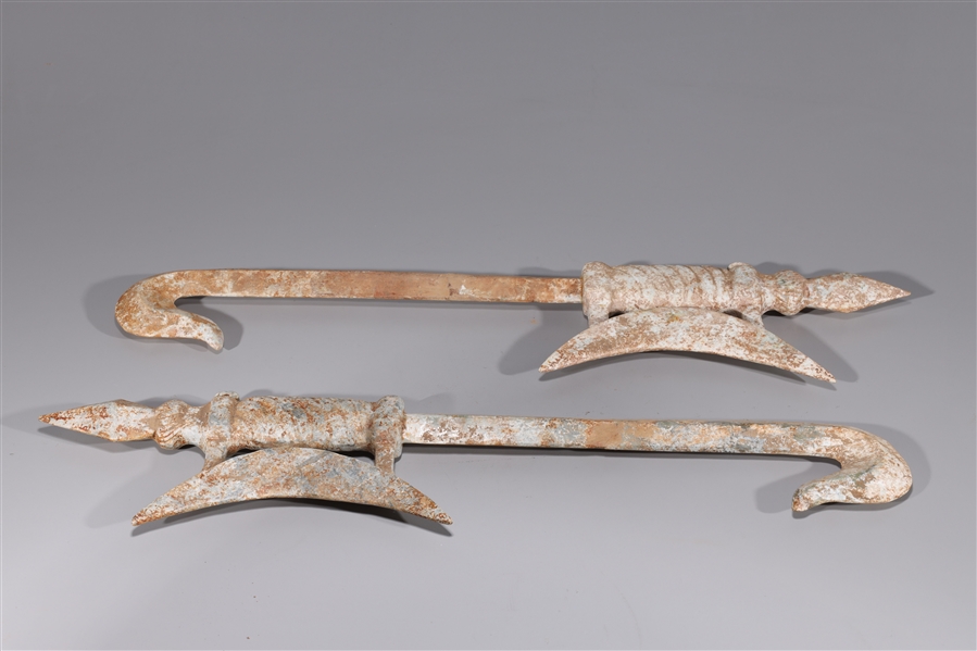 Appraisal: Pair Chinese carved hardstone weapons each blade broken and repaired