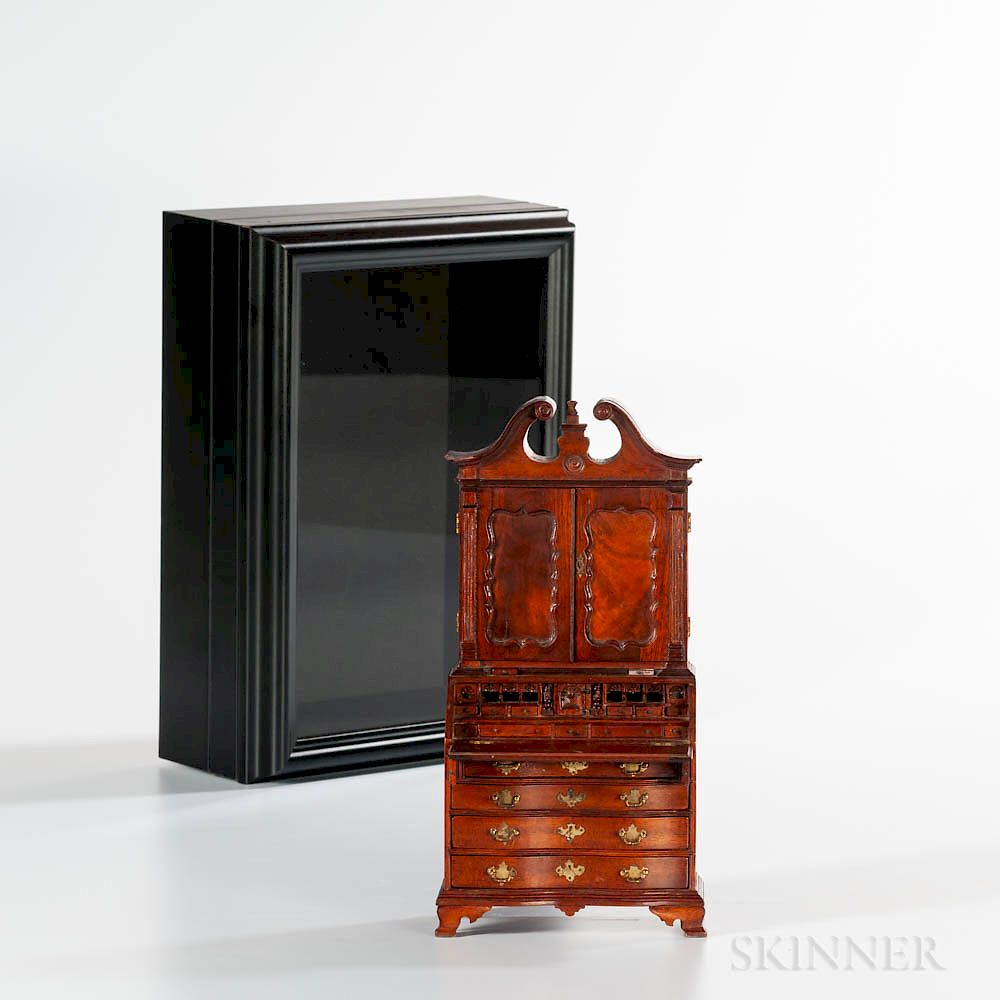 Appraisal: Miniature Carved Serpentine-front Scroll-top Desk Bookcase Miniature Carved Serpentine-front Scroll-top