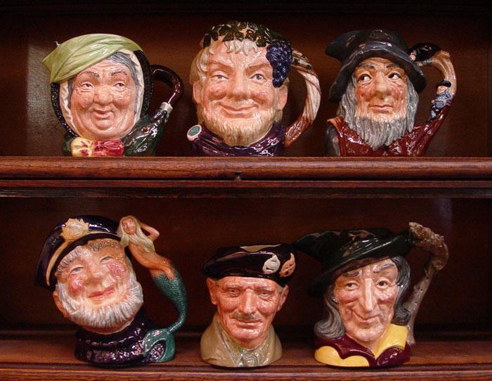 Appraisal: ROYAL DOULTON LARGE CHARACTER JUGS To include BACCHUS D MONTY