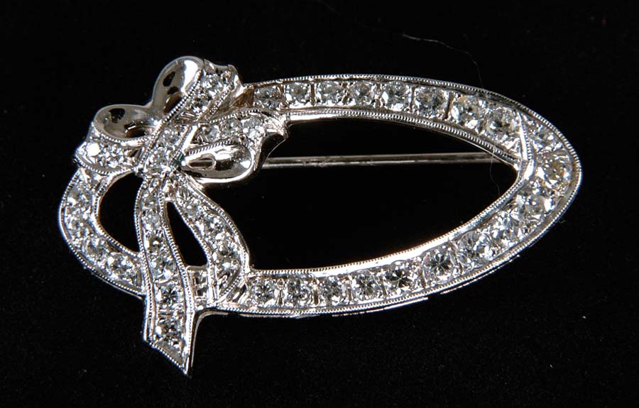 Appraisal: DIAMOND BROOCH This lovely k white gold brooch has oval