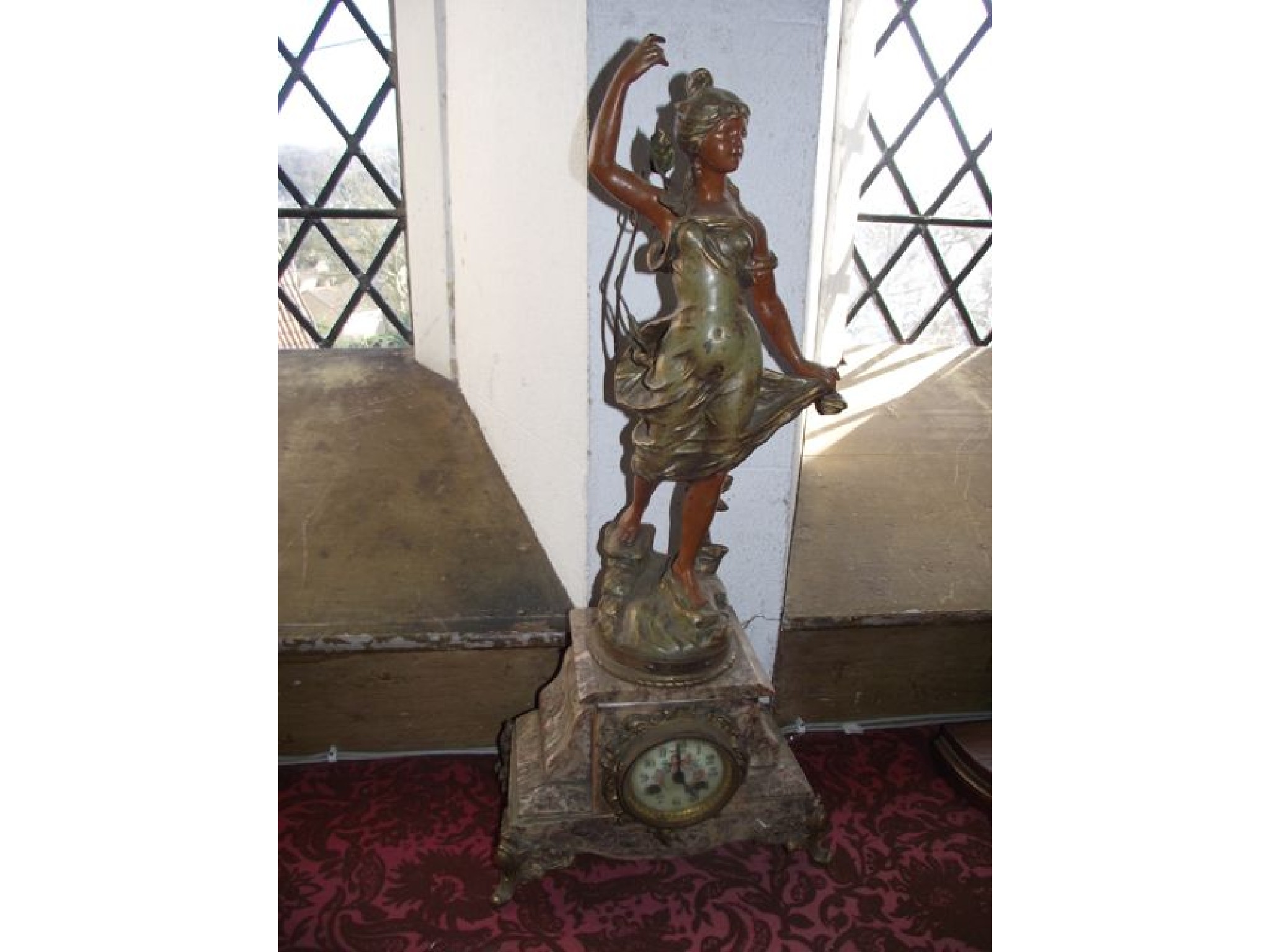 Appraisal: A th century marble and spelter mounted mantel clock with