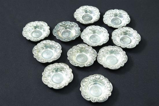 Appraisal: EIGHT STERLING SILVER NUT DISHES Edges decorated with a strawberry