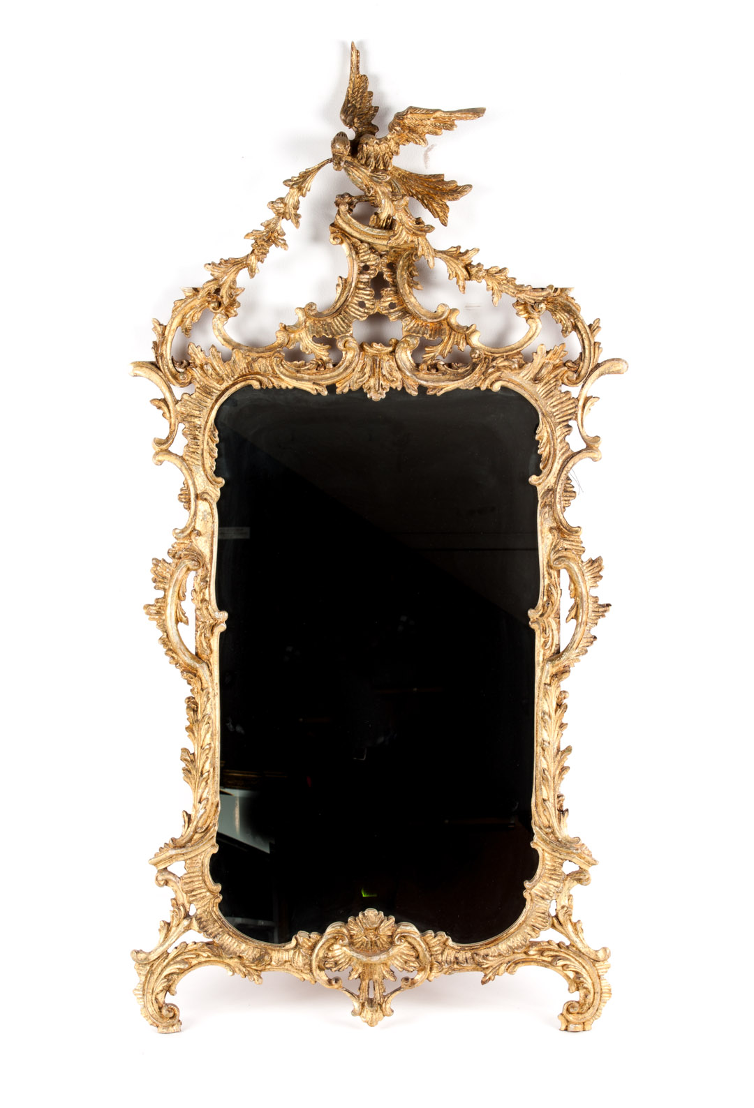 Appraisal: Chippendale style carved and gilded wood mirror phoenix bird and