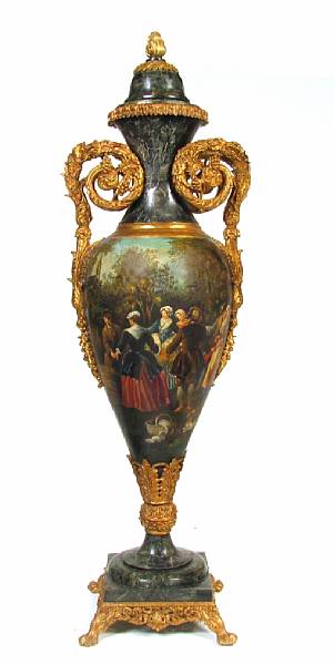 Appraisal: A large paint decorated and gilt marble covered urn height