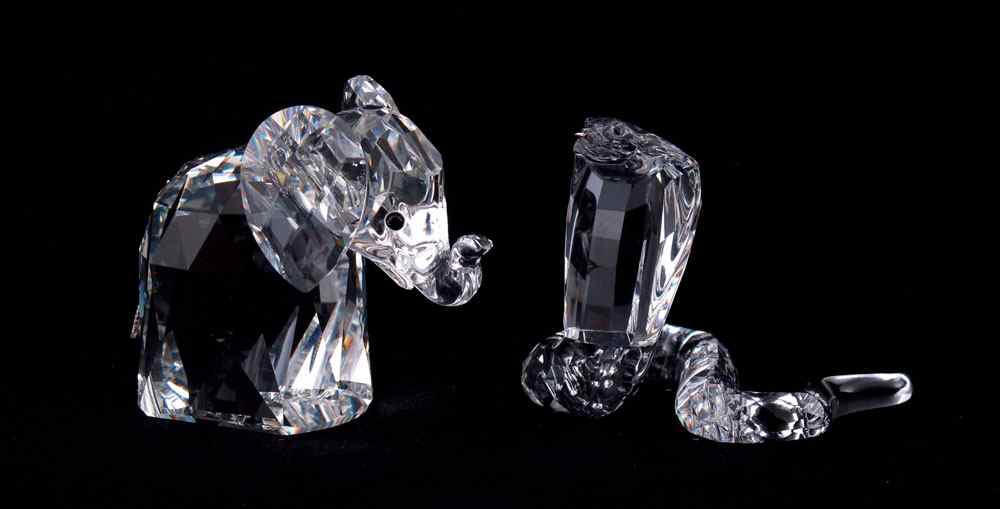 Appraisal: SWAROVSKI CRYSTAL FIGURINES To include LARGE ELEPHANT floppy metal tail