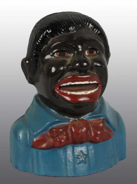 Appraisal: Cast Iron Uncle Tom with Star Mechanical Bank Description Manufactured