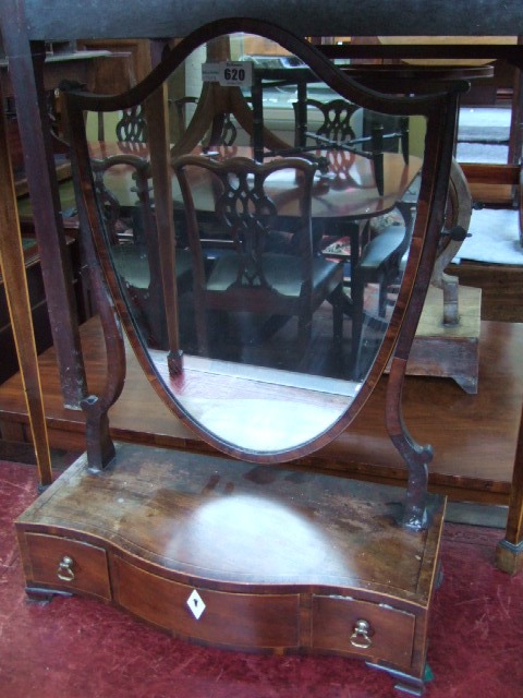 Appraisal: A th century mahogany swing frame toilet mirror the shield