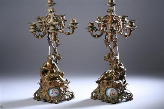 Appraisal: PAIR LOUIS XV-STYLE BRONZE-DOR FIVE-LIGHT CANDELABRA th century Shaped figural