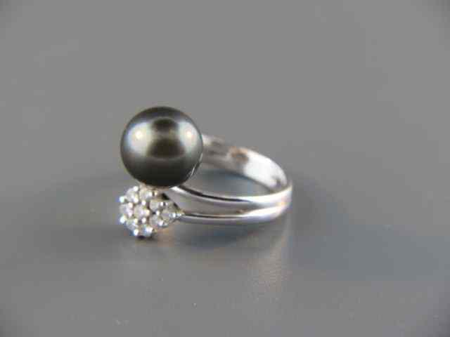 Appraisal: Black Pearl Diamond Ring mm pearl and diamonds totaling carat