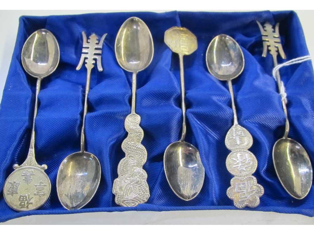 Appraisal: A cased set of oriental white metal spoons