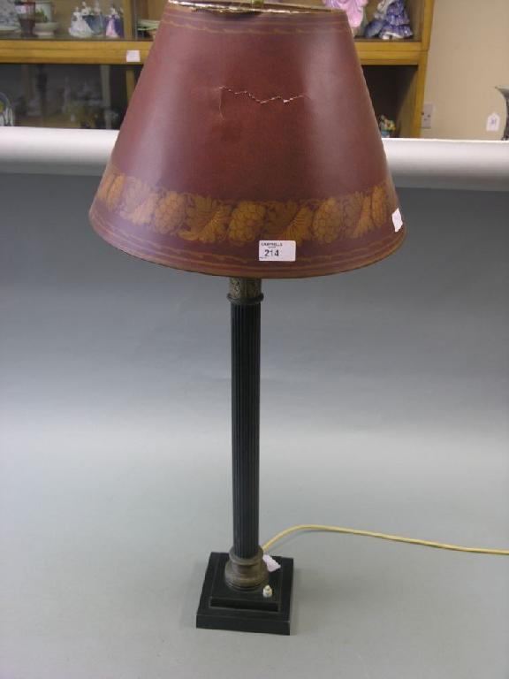 Appraisal: An electric table lamp fluted stem with brass corinthian capital