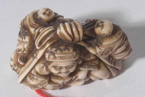 Appraisal: NETSUKE Japan Meiji Period L cm Ivory The God of