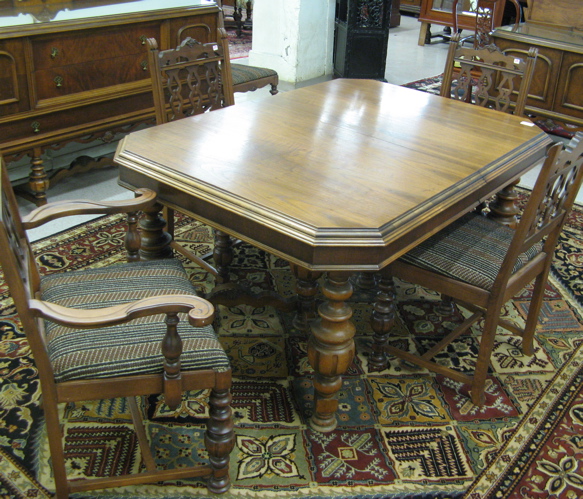 Appraisal: NINE-PIECE WALNUT DINING SET American c 's comprising rectangular dining