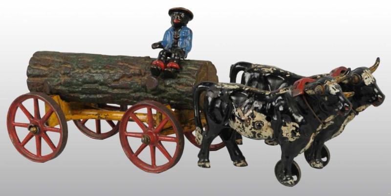 Appraisal: Cast Iron Hubley -Oxen Log Wagon Toy Description Pulled by