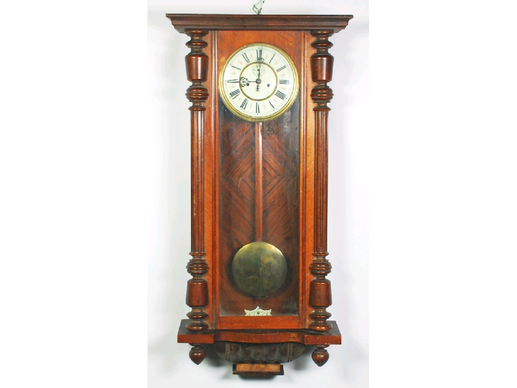 Appraisal: WALNUT VIENNA WALL CLOCK CIRCA the in two piece enamelled