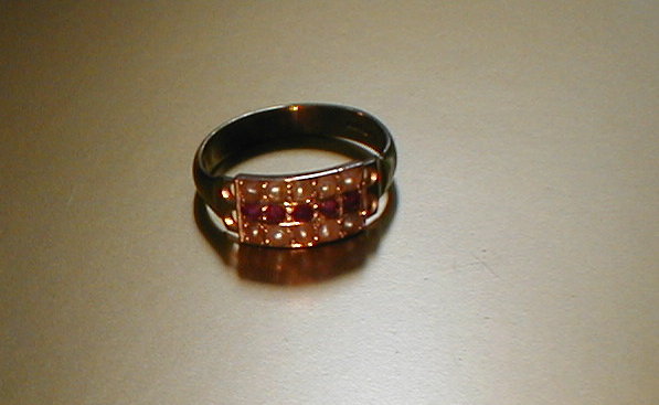 Appraisal: A ct gold red stone and seed pearl set ring