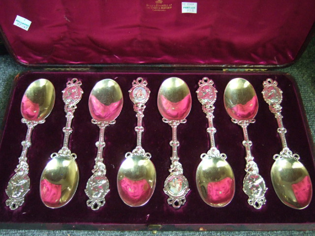 Appraisal: A set of six cast dessert spoons with gilt bowls