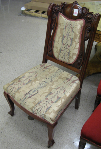 Appraisal: LATE VICTORIAN CHERRYWOOD HALL CHAIR American c - having a