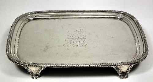 Appraisal: A George III silver rectangular salver with gadroon mounts and