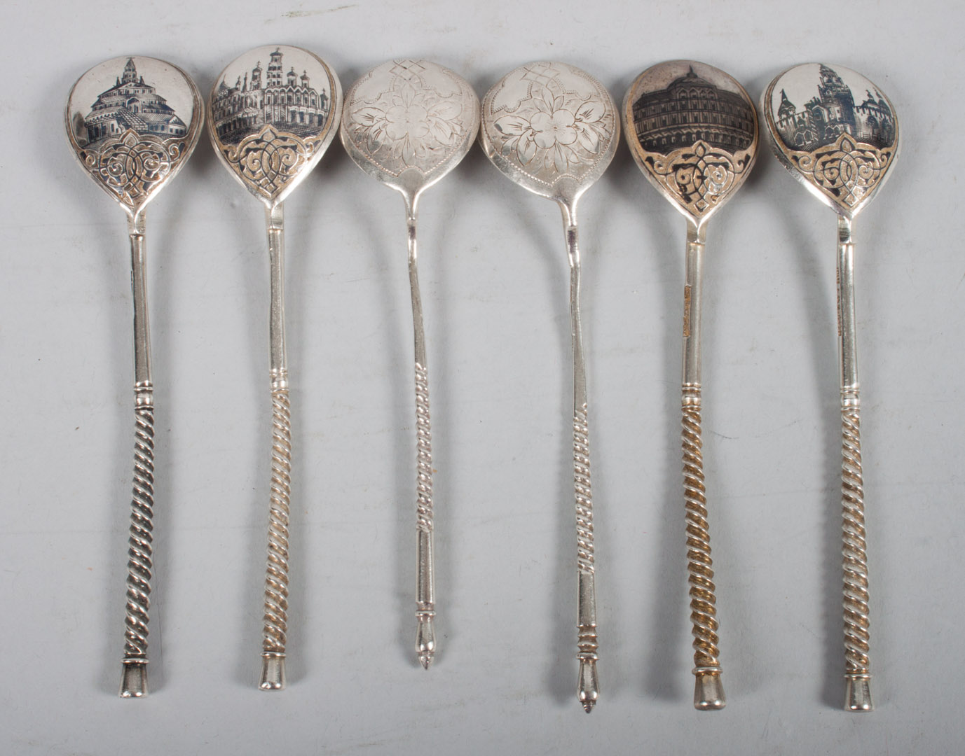 Appraisal: Four Russian niello enamel silver condiment spoons together with two