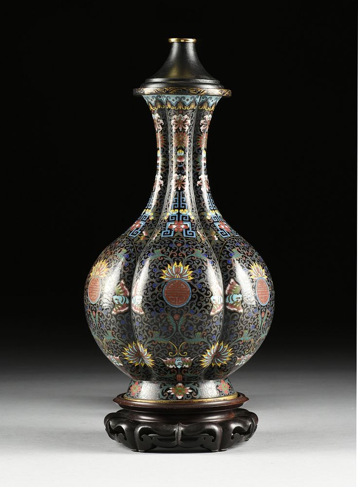 Appraisal: AN ANTIQUE CHINESE POLYCHROME ON BLACK GROUND ENAMELED CLOISONN BOTTLE