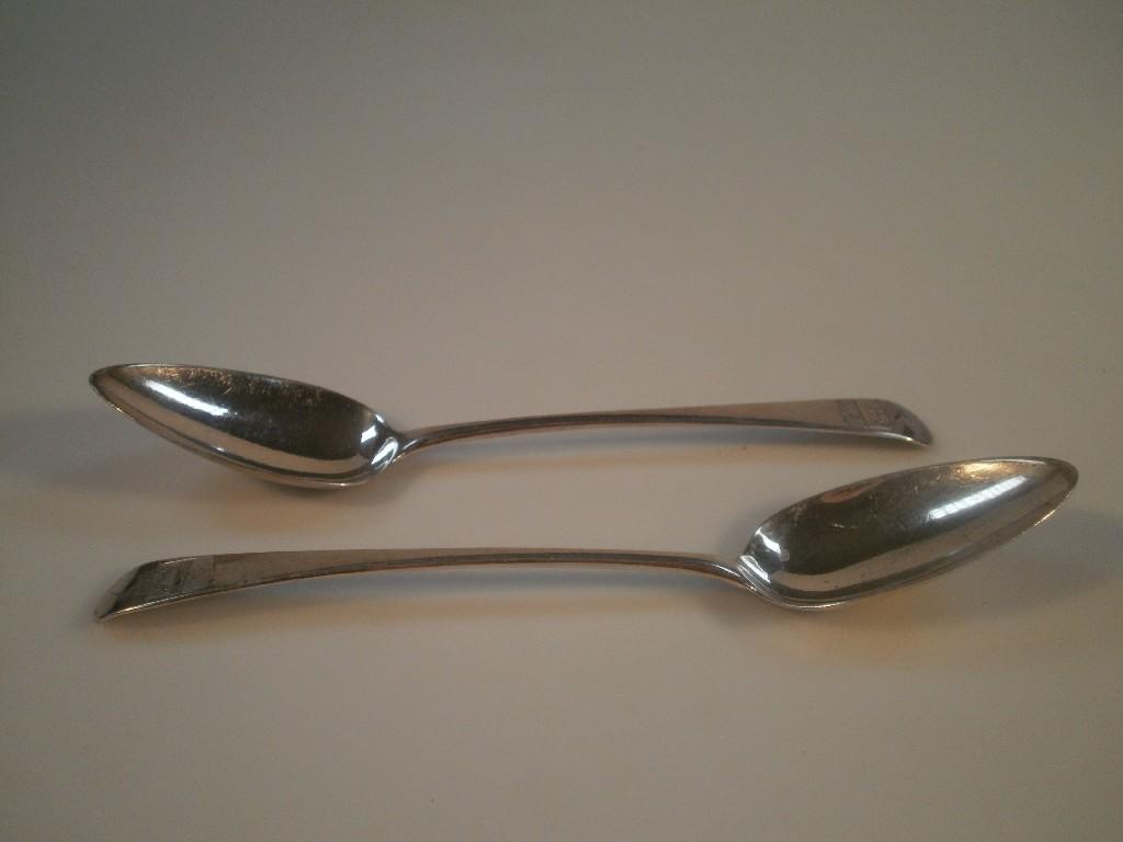 Appraisal: A pair of George III Old English pattern table spoons