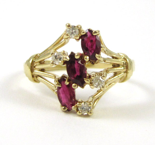 Appraisal: RUBY DIAMOND AND TEN KARAT GOLD RING set with three