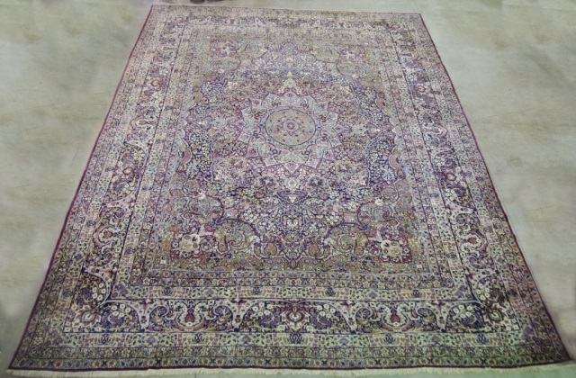 Appraisal: Kirman Wool on Cotton Oriental RugCirca Blue ground with lighter