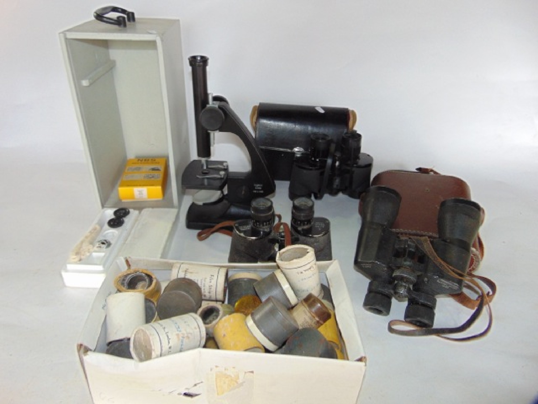 Appraisal: A miscellaneous collection to include a cased microscope a cased