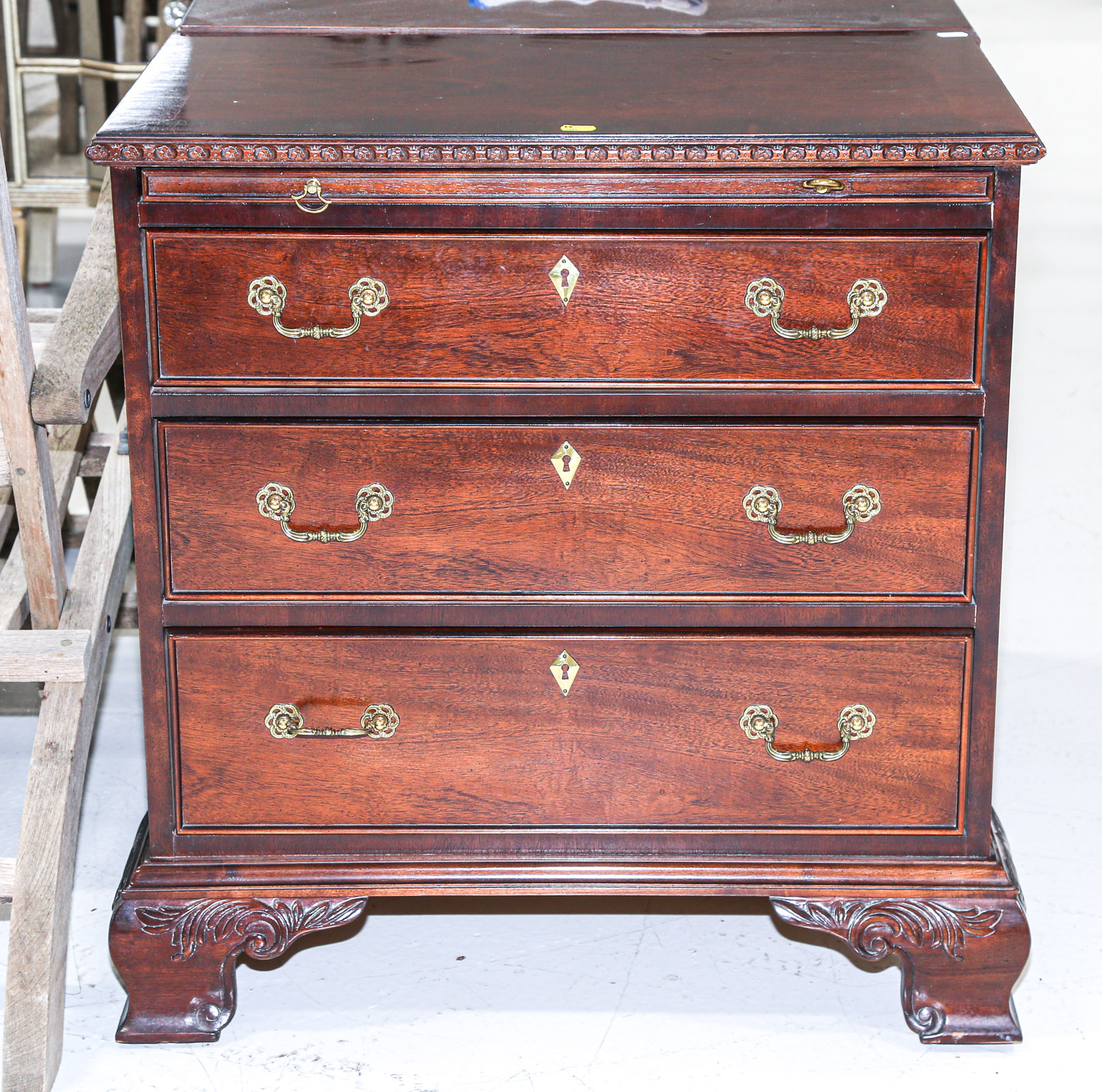 Appraisal: CENTURY CHIPPENDALE MAHOGANY BACHELOR'S CHEST Modern with pullout brush slide