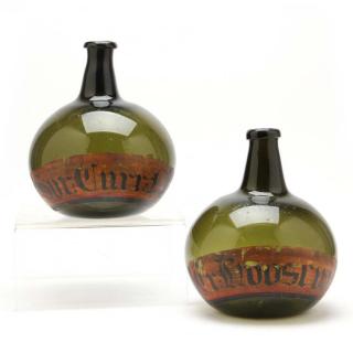 Appraisal: A Pair of Onion Style Glass Apothecary Bottles first half