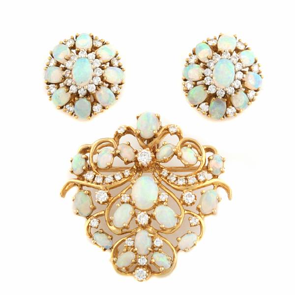 Appraisal: A collection of opal diamond and gold jewelry featuring one