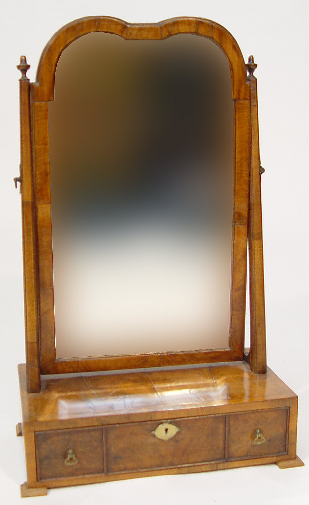 Appraisal: Victorian walnut bevel edged toilet mirror the cross-banded frame above