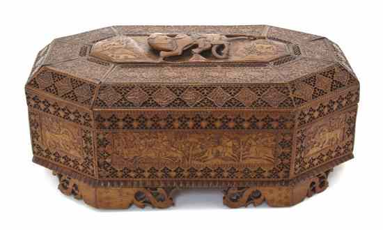 Appraisal: A Middle Eastern Carved Wood Box of octagonal form decorated